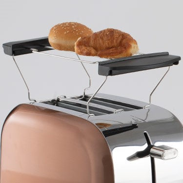 Tostador Retro con Diseño Vintage Color Copper Tech y Soft Cream. Cocina elegante. Tostador 900 W, 2 ranuras con accesorio para bollería. Ajuste de tostado. Funciones Descongelar Recalentar y Cancelar. Panel luces LED. Bandeja Recogemigas extraíble. Bolsa para Tostador Incluida